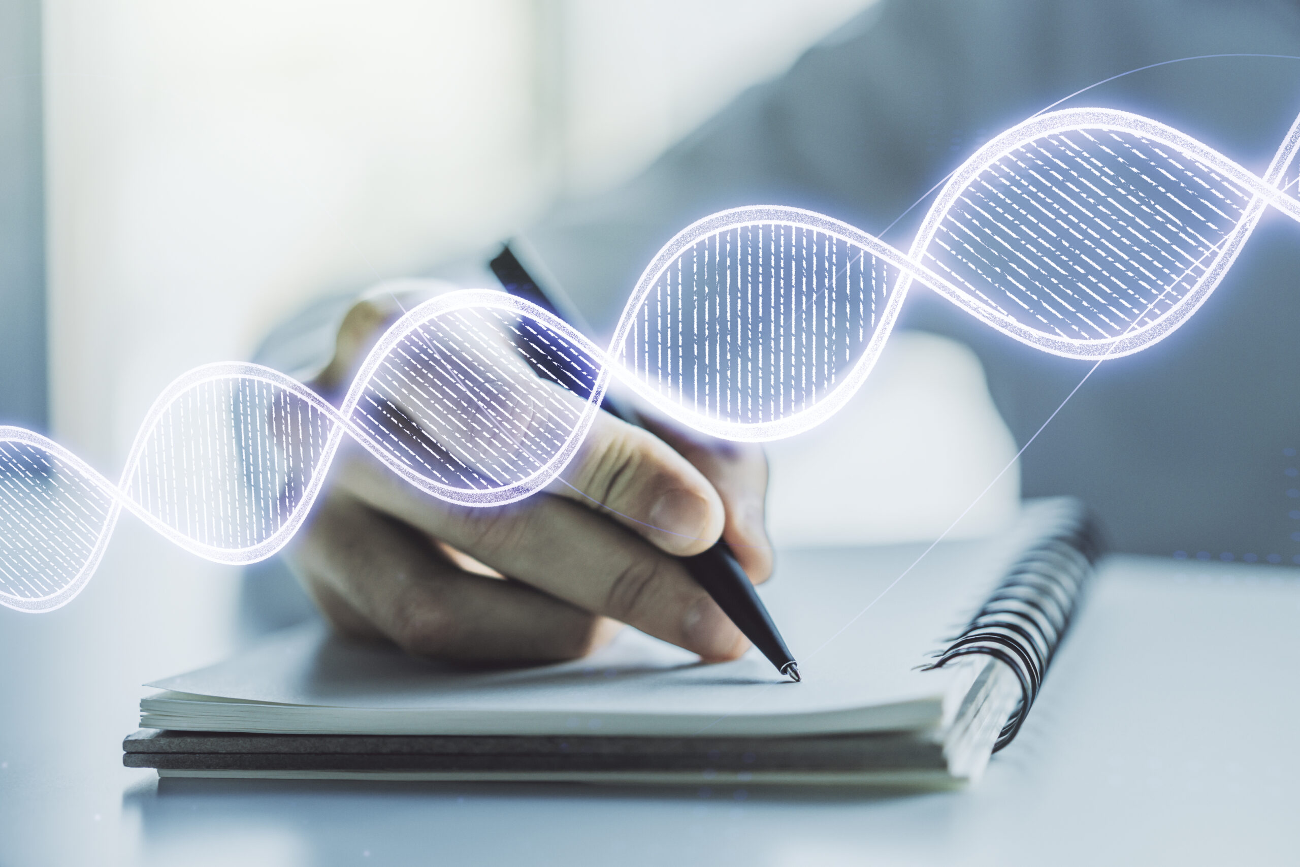 Creative light DNA illustration and man hand writing in diary on background, science and biology concept